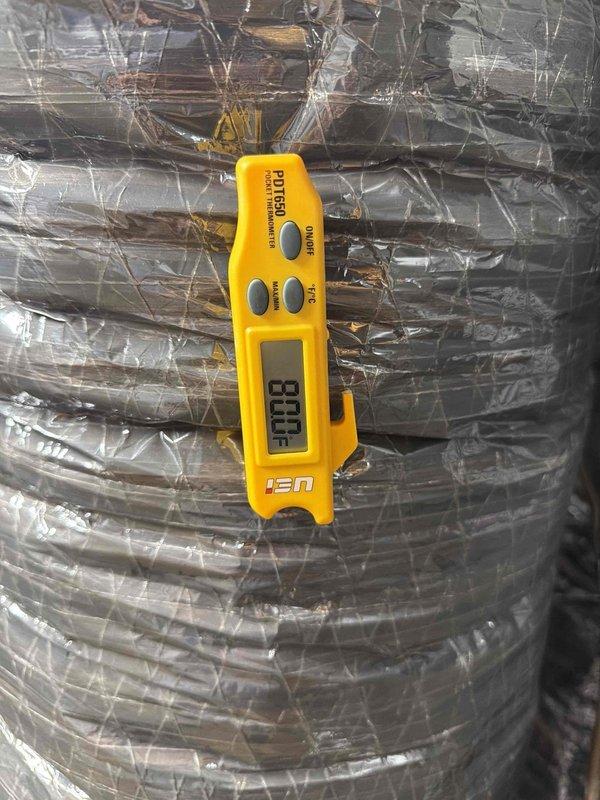 Performed scheduled tune-up service on three HVAC units. Conducted temperature differential measurements using UEi PDT550 digital thermometer, with readings documented at 00.0°F and 5.18°F across the insulated ductwork. Inspected insulation integrity, finding properly secured metallic reflective insulation with no visible damage or deterioration.