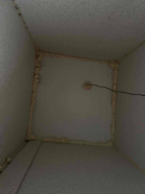 # HVAC Estimate - Replacement Summary

Conducted comprehensive system assessment for mobile home requiring full HVAC replacement estimate. Evaluated existing aged furnace unit housed in compact utility closet with vertical installation configuration. Documented current equipment condition showing significant wear and deterioration. Assessed confined installation space with white painted trim enclosure and adjacent renovation areas. Noted evidence of moisture infiltration and staining in utility compartment, indicating potential ventilation or condensate drainage concerns requiring attention during replacement. Coordinated site visit with property occupants to gather necessary contact information and discuss additional equipment estimates including water heater and water softener systems.