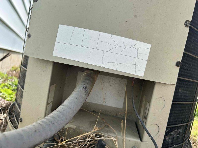 Conducted on-site assessment for complete air conditioning system replacement. Evaluated existing outdoor condensing unit showing significant weathering, cracked condenser coil panels, and debris accumulation, as well as indoor air handler positioned in utility closet space. Provided comprehensive replacement estimate with equipment specifications and installation requirements for both outdoor and indoor HVAC components.