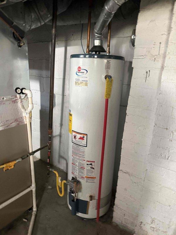 Completed annual heating maintenance inspection on residential HVAC system. Performed comprehensive safety testing including carbon monoxide measurements at heat exchanger, which registered 0 PPM indicating proper combustion and no hazardous gas leakage. Inspected furnace heat exchanger for corrosion and structural integrity, examined all gas connections and venting components for proper operation. Verified water heater installation and venting system, confirming all safety labels present and gas line connections secure. All equipment operating within manufacturer specifications with no immediate safety concerns identified.