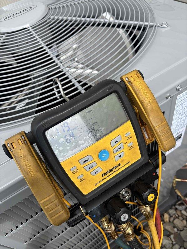 Completed full HVAC system replacement including installation of Carrier Infinity 100K BTU 2-stage gas furnace, Carrier Performance 3-ton 2-stage air conditioning unit, and Ecobee Pro 6 thermostat. Installed new copper line-set, electrical disconnect, and condenser pad on gravel base. Connected furnace to existing PVC intake and exhaust venting, ran refrigerant lines, and performed system startup with refrigerant charging and pressure testing to verify proper operation of both heating and cooling systems.