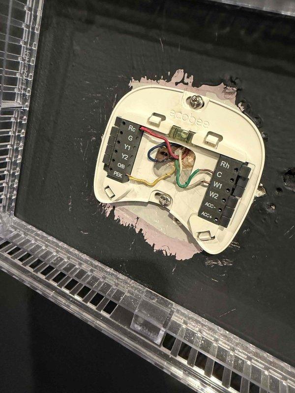 Responded to service call for Ecobee thermostat displaying blank screen in sanctuary while HVAC system continued running in cooling mode. Inspected thermostat wiring connections and verified proper terminal assignments including Rc, C, G, Y1, Y2, W1, and W2 circuits. Diagnosed power supply issue to thermostat, tested voltage at C-wire common terminal, and confirmed furnace control board functionality. Restored proper power delivery to thermostat, re-established communication between thermostat and HVAC equipment, and verified system operation in all modes including heating and cooling cycles.