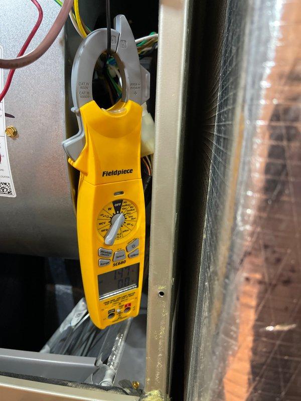 Performed pre-purchase HVAC system inspection at residential property with seller's agent authorization. Conducted comprehensive examination of furnace and air handler unit, including visual inspection of electrical control compartment, wiring connections, and safety devices. Verified integrity of wire terminations with twist-on connectors, inspected pressure switches, and examined refrigerant line insulation. Performed electrical diagnostic testing using clamp meter to assess system operation and current draw. Evaluated evaporator coil condition and overall unit safety for occupant with health considerations. System found to be in serviceable condition with no immediate safety concerns identified.