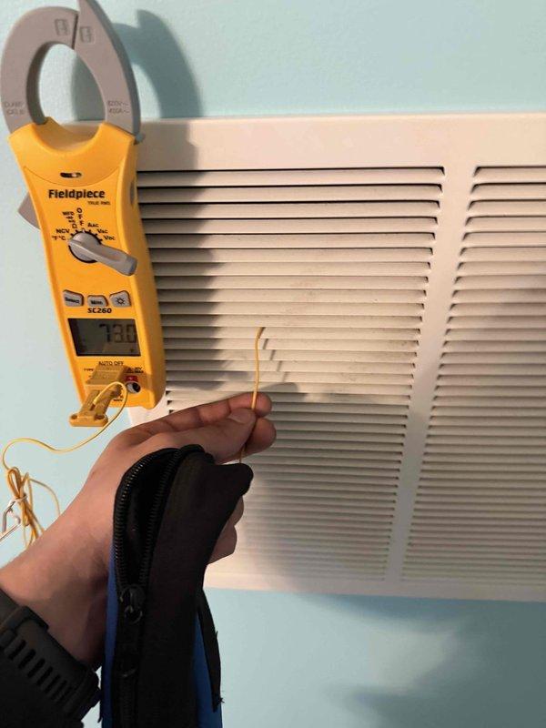 Completed diagnostics on residential HVAC system and replaced failed capacitor on outdoor condensing unit. Verified proper amperage draw of 7.18 amps at supply vent using clamp meter after capacitor replacement. System tested and operating within normal parameters.