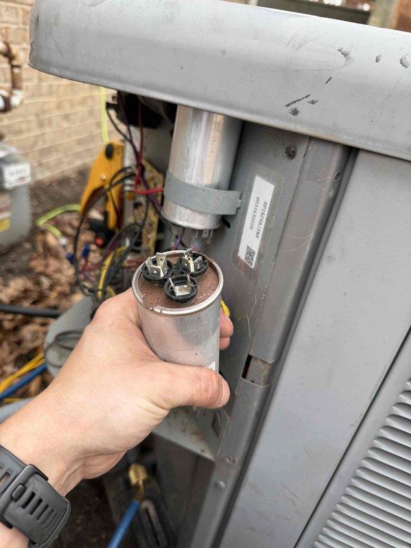 Completed diagnostics on residential HVAC system and replaced failed capacitor on outdoor condensing unit. Verified proper amperage draw of 7.18 amps at supply vent using clamp meter after capacitor replacement. System tested and operating within normal parameters.