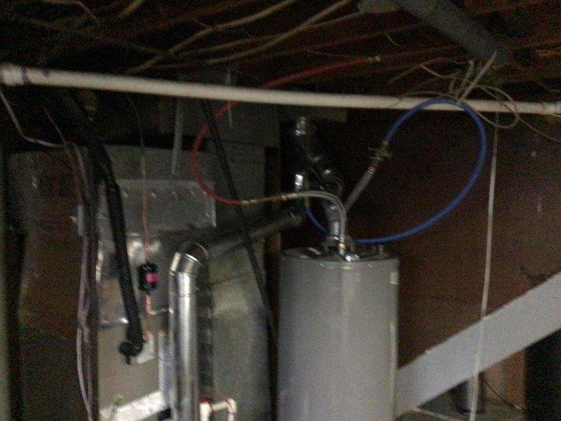 Completed full HVAC system replacement including installation of a Carrier Comfort Series 80% AFUE 70,000 BTU gas furnace and Carrier Comfort Series 2.5-ton air conditioning system with Carrier Wi-Fi thermostat. Flushed and reused existing copper lineset, installed new condenser pad and disconnect, added Aprilaire media filter, and removed old humidifier from system.