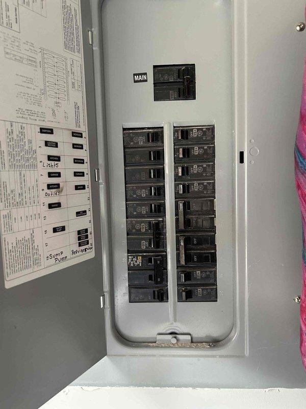 Conducted comprehensive assessment of existing heating system for furnace replacement. Evaluated current Emerson digital thermostat displaying 74° in heating mode and documented electrical panel configuration showing dual columns of circuit breakers with main breaker compartment. Reviewed system specifications and existing infrastructure to determine replacement requirements. Provided customer with financing options for furnace replacement project.