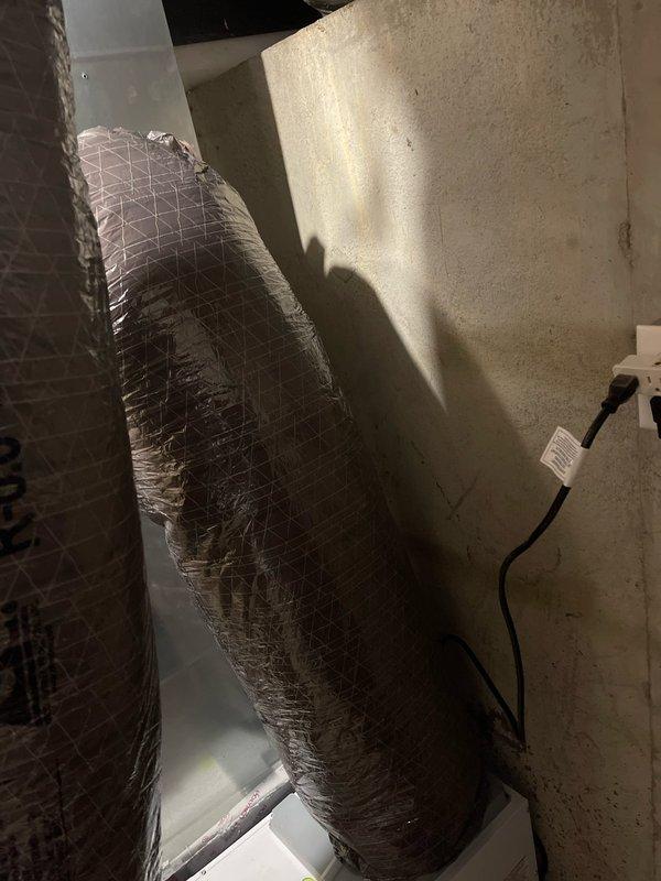 Removed deteriorated duct board supply ductwork from basement utility area and installed new duct board supply with proper insulation and sealing. Reconnected all existing supply ducts to new trunk line, ensuring proper airflow distribution throughout the system. Installed new Aprilaire E100 whole-home dehumidifier and integrated ducting into the return air plenum of the HVAC system to provide humidity control and improve indoor air quality.