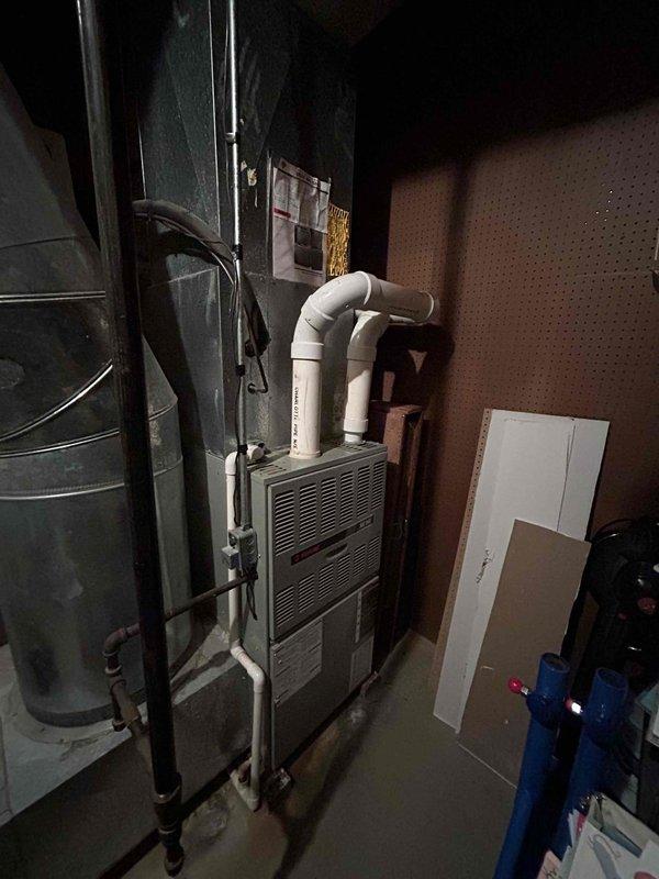 Conducted on-site assessment of existing residential HVAC system for full replacement estimate of electric air conditioning unit and gas furnace. Evaluated current equipment configuration in basement mechanical room, including existing furnace with PVC venting system and associated electrical panel with circuit distribution. Documented equipment specifications, spatial requirements, and electrical infrastructure to provide comprehensive replacement proposal for complete heating and cooling system upgrade.