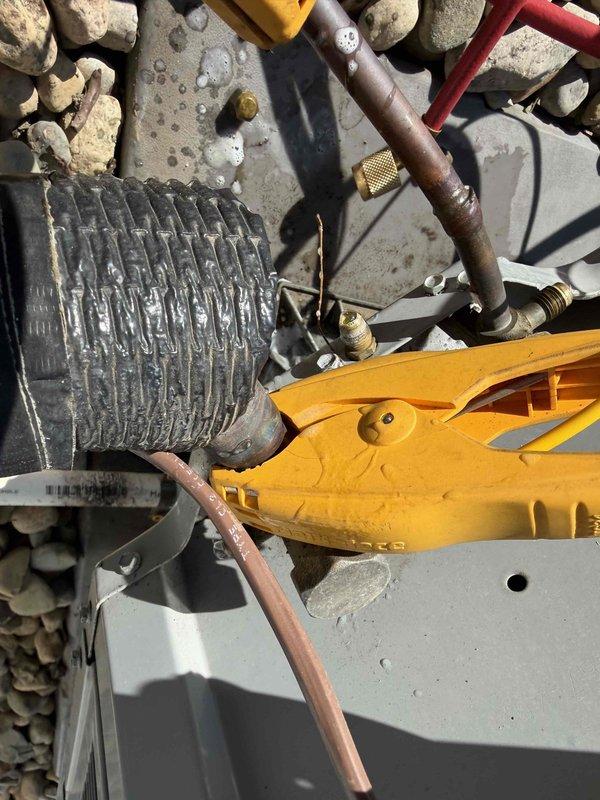 Completed annual cooling maintenance on residential HVAC system and addressed thermostat system fault error code. Performed comprehensive inspection of outdoor condensing unit including refrigerant lines, copper tubing connections, and ductwork. Diagnosed and cleared system fault, verified proper operation of all components, checked refrigerant pressures using manifold gauges, and inspected electrical connections and mounting hardware to ensure system functionality.