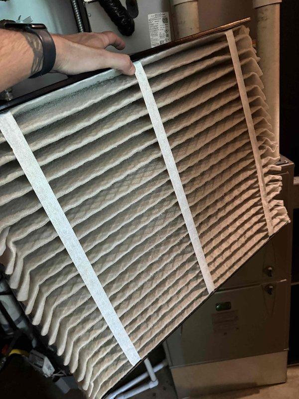 Completed comprehensive 2026 cooling maintenance inspection on HVAC system. Performed standard cooling system maintenance procedures and inspected all requested components including furnace filters, humidifier, and HALO air purification unit to verify proper operation. Replaced heavily soiled air filter with new filter, documenting significant dust and debris accumulation on old filter. Inspected ductwork and damper mechanisms, noting dust buildup throughout system interior. Verified HALO bulb functionality and confirmed all requested components are operating within normal parameters.