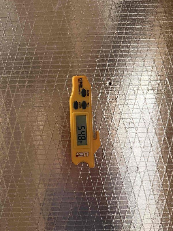 Responded to cooling complaint on recently installed system not reaching thermostat setpoint. Performed diagnostic temperature measurements at supply register, which confirmed inadequate airflow or cooling performance with supply air temperature reading 38.5°F. Documented equipment conditions and temperature readings for warranty processing and further evaluation of system performance issue.