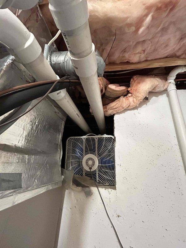 Completed comprehensive estimate for full HVAC system replacement on 16-year-old existing equipment. Evaluated current Honeywell programmable thermostat and assessed crawl space installation including existing ductwork, insulation, and ventilation components. Documented system configuration with pink fiberglass insulation between joists, PVC plumbing infrastructure, metallic reflective duct insulation, and crawl space ventilation fan. Provided replacement recommendations based on current system age and condition assessment.