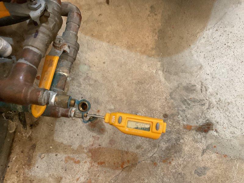 Completed maintenance tune-up on HVAC system. Performed system diagnostics using digital testing equipment, checked system pressures and temperatures at boiler connections, and inspected copper piping and valve assemblies. Noted visible corrosion and oxidation on copper lines; system operating within acceptable parameters at time of service.
