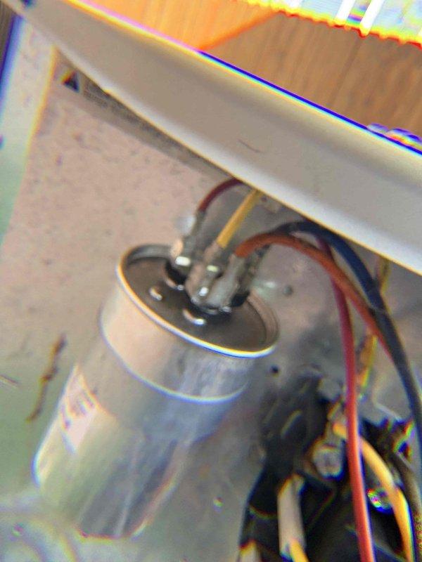 Completed preventive maintenance on outdoor condensing unit. Performed electrical diagnostics using digital multimeter, tested capacitor functionality and verified proper voltage readings across all electrical connections. Inspected wiring harness and terminal connections, confirmed all wire connections secure and within manufacturer specifications.