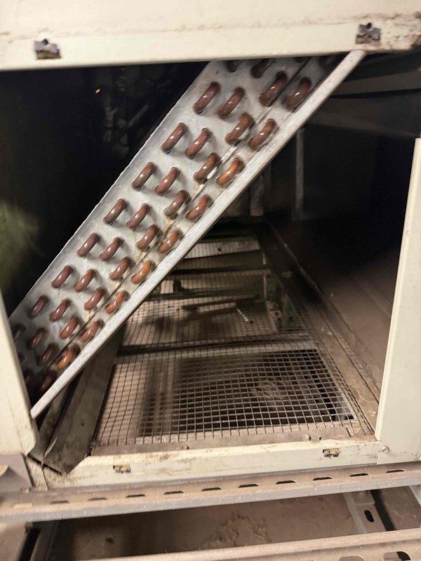 Responded to commercial AC unit leaking water in breakroom area. Upon inspection, found clogged condensate drain line causing water to overflow from drain pan onto floor. Cleared obstruction from drain line, verified proper drainage flow, and inspected evaporator coil and filter for additional issues. Cleaned dirty air filter and drain pan, tested unit operation to confirm leak resolved and proper cooling function restored.