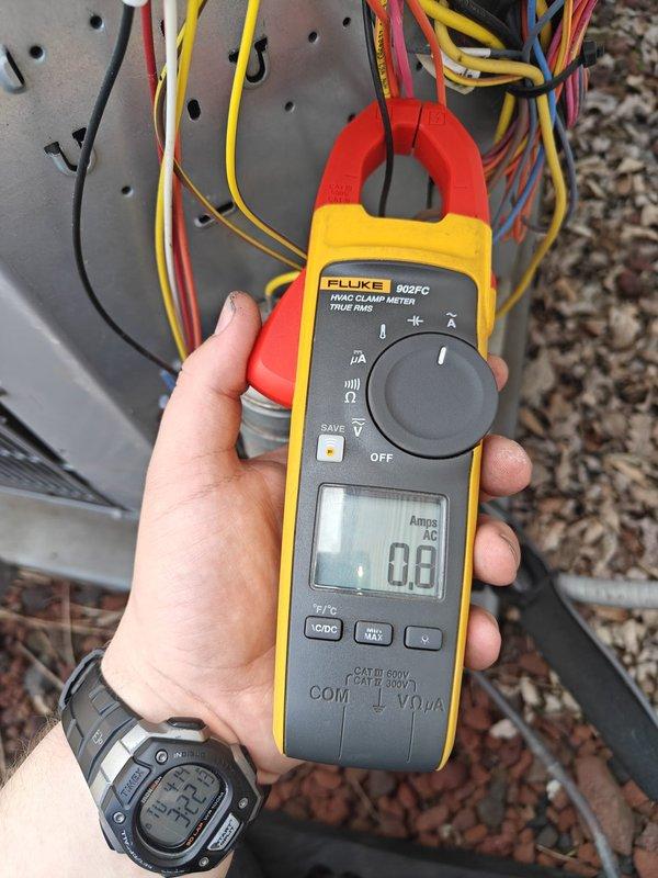 Completed comprehensive AC tune-up on residential air conditioning system. Inspected evaporator coil assembly and noted moderate dust accumulation on heat exchanger fins; verified refrigerant lines and electrical connections throughout air handler. Measured system amperage draw at 0.08 amps using clamp meter at outdoor condensing unit, confirming electrical performance within manufacturer specifications.