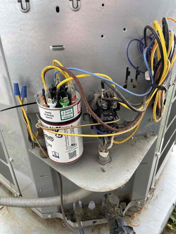 Responded to no cooling complaint with indoor temperature at 81°F and unit blowing hot air. Performed diagnostic inspection of outdoor condensing unit and found failed dual run capacitor preventing compressor and condenser fan operation. Tested electrical components including contactor and verified proper voltage supply to unit. Replaced defective capacitor, restored system to normal operation, and confirmed proper cooling cycle with adequate temperature differential at supply registers.