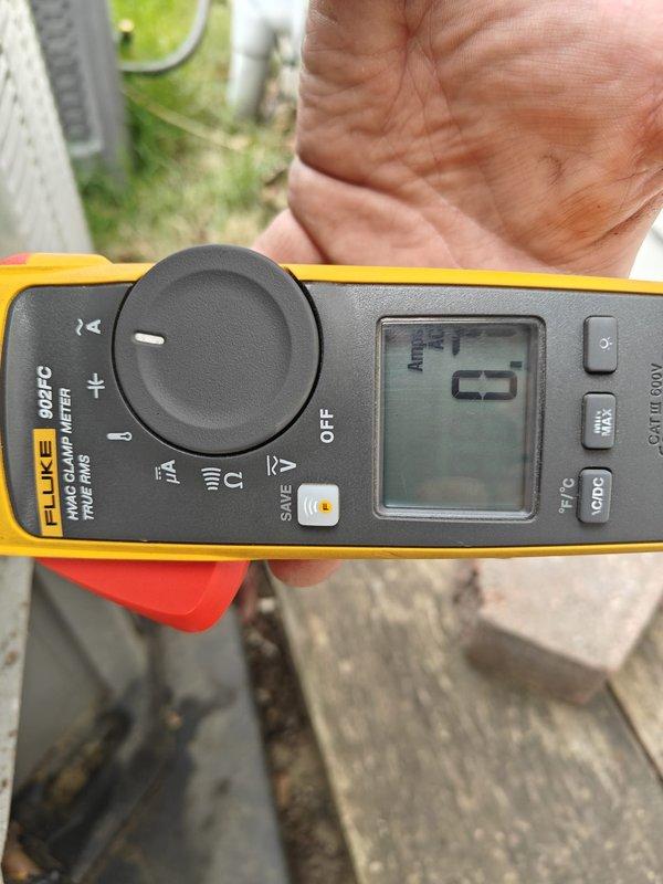 Performed comprehensive AC tune-up including electrical diagnostics using digital clamp meter to verify proper amperage draw and system performance. Inspected air filtration system, noting filter in good condition with clean pleated media and intact support frame. Presented maintenance plan options for homeowner consideration to ensure continued system reliability.