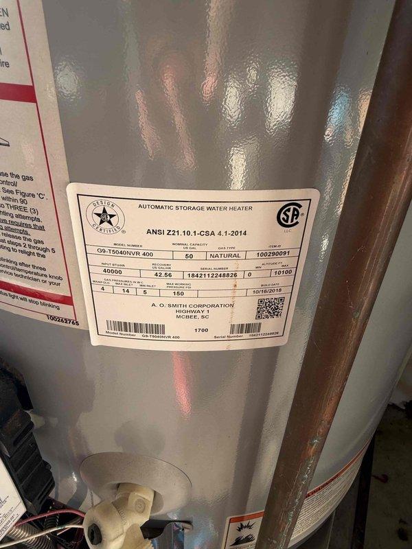 Completed comprehensive assessment and quotation for water heater replacement. Inspected existing A.O. Smith 40-gallon natural gas water heater showing signs of age-related deterioration, including significant rust staining and corrosion on the base platform, surface condensation on tank exterior, and visible moisture damage to surrounding concrete foundation. Documented current unit specifications (Model G9-T2040NVR 400, ANSI Z21.10.1-CSA 4.1-2014 certified) and evaluated existing plumbing connections, gas line configuration, and venting system. Photographed equipment condition, installation environment, and corrosion patterns to support replacement recommendations. Provided detailed estimate for new water heater installation including removal and proper disposal of existing unit, preparation of installation area to address moisture issues, and connection to existing natural gas and water supply lines.