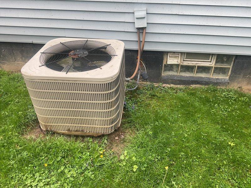 Conducted on-site evaluation of existing residential HVAC system for complete air conditioning replacement estimate. Assessed outdoor condenser unit showing significant age-related deterioration, weathering, and reduced efficiency, along with indoor air handler and associated refrigerant lines and condensate drainage system. Provided comprehensive replacement options and specifications for new cooling system installation.