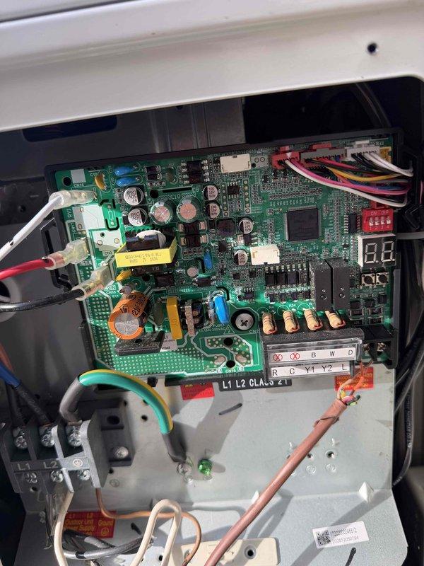 Responded to no heat call on recently installed HVAC system. Upon arrival, verified thermostat calling for heat but indoor temperature not reaching setpoint of 73°, remaining at 71°. Performed voltage testing at outdoor unit disconnect using multimeter, confirming 35 volts present at condenser unit terminals. Inspected furnace control board and identified fault condition indicated by LED diagnostic code display showing "88". Determined control board failure preventing proper system operation. Issue resolved and heating system restored to normal operation.