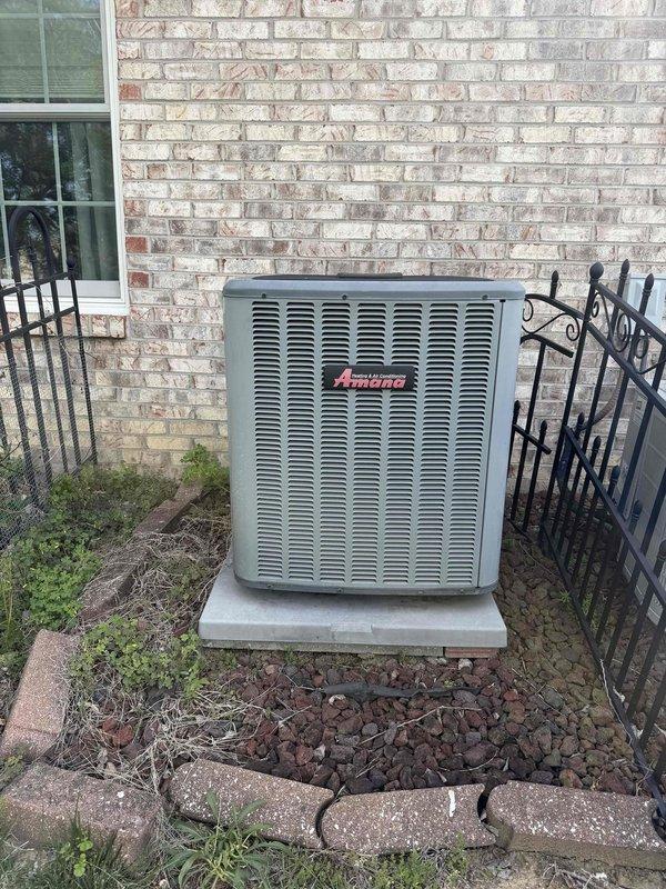 # HVAC Maintenance - Cooling System Service

Completed comprehensive cooling maintenance on residential Amana condensing unit. Performed standard inspection of outdoor unit components, refrigerant lines, and heat exchanger assembly. Unit is positioned on concrete pad with proper clearance from building exterior. All accessible components were evaluated for operational integrity and wear patterns. Refrigerant tubing and serpentine coil configuration inspected for proper connections and potential leak points. Noted surface oxidation and weathering consistent with normal outdoor equipment aging on heat exchanger housing and metal panels. Equipment shows typical wear patterns but remains functional. Customer renewed maintenance plan for continued service coverage.