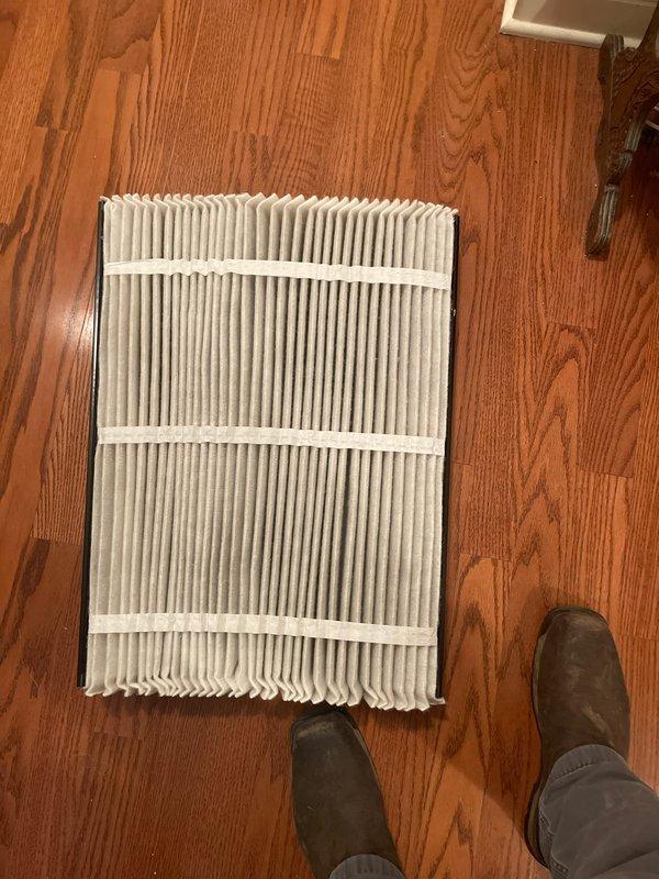 Completed scheduled cooling maintenance on residential HVAC system. Performed electrical diagnostics on outdoor condensing unit using digital multimeter, verifying proper voltage and system operation at terminal connections. Inspected and documented condition of air filter, which showed moderate dust accumulation consistent with normal usage.