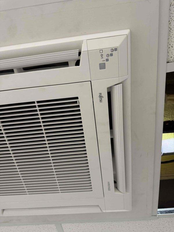 Responded to no cool call for Fujitsu wall-mounted cassette unit in Mortin Building. Diagnosed system using refrigerant scale and appropriate testing equipment. Restored cooling operation to affected unit. Additionally performed preventative maintenance tune-up on AC system in Loading Building, including standard inspection and performance verification procedures.