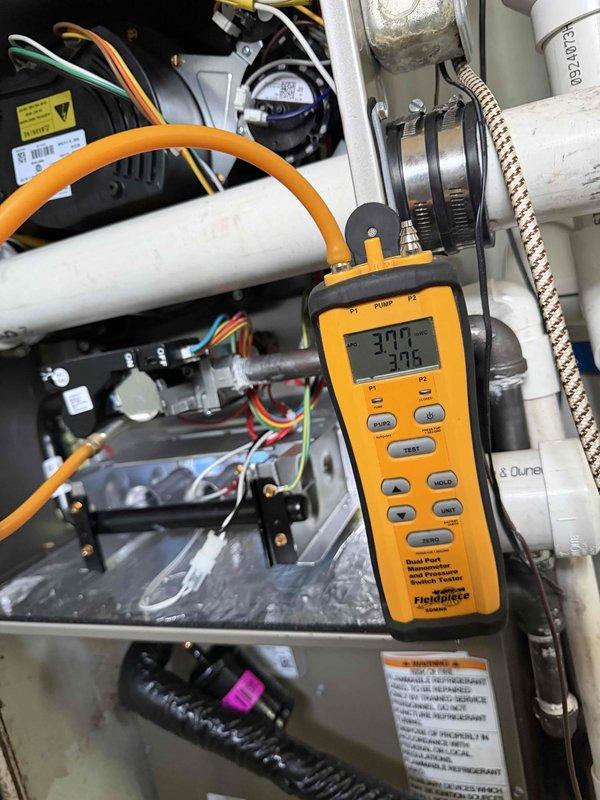 Responded to warranty call for newly installed heating system not operating properly. Performed diagnostic testing using digital manifold gauge to verify gas pressures and system operation. Adjusted thermostat staging settings from high to low fire configuration to resolve heating performance issue. System now operating within manufacturer specifications and providing adequate heat output.