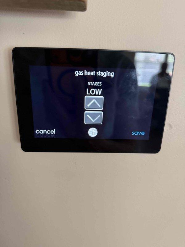Responded to warranty call for newly installed heating system not operating properly. Performed diagnostic testing using digital manifold gauge to verify gas pressures and system operation. Adjusted thermostat staging settings from high to low fire configuration to resolve heating performance issue. System now operating within manufacturer specifications and providing adequate heat output.