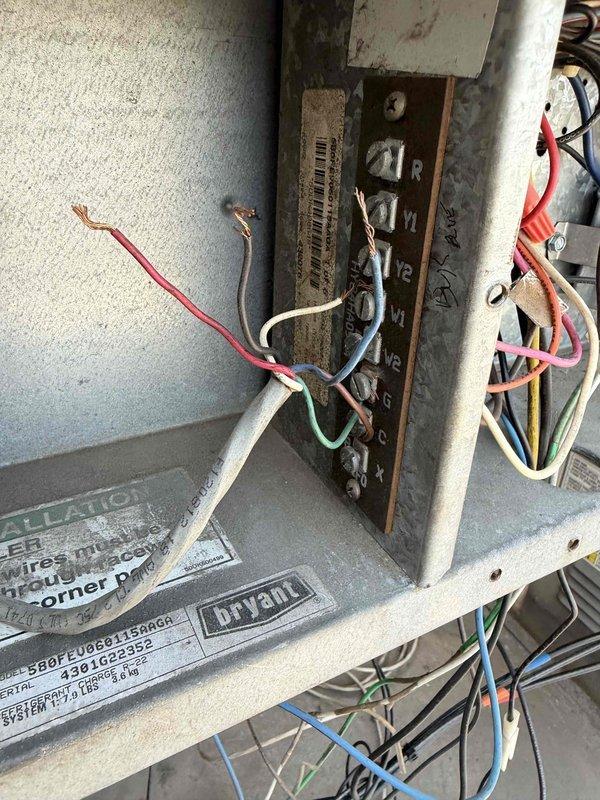 Responded to no heat or AC call at commercial complex. Performed complete diagnostic on rooftop packaged HVAC unit. Upon inspection, found severely corroded electrical panel and junction box with deteriorated wiring connections. Multiple wire insulation failures noted with exposed copper conductors present. Terminal blocks showed significant rust and corrosion affecting electrical continuity. Internal unit components accessed for full system evaluation. Documented existing conditions with photos for repair quote submission. Unit requires electrical panel replacement, rewiring of corroded connections, and assessment of additional mechanical components before system can be safely restored to operation.