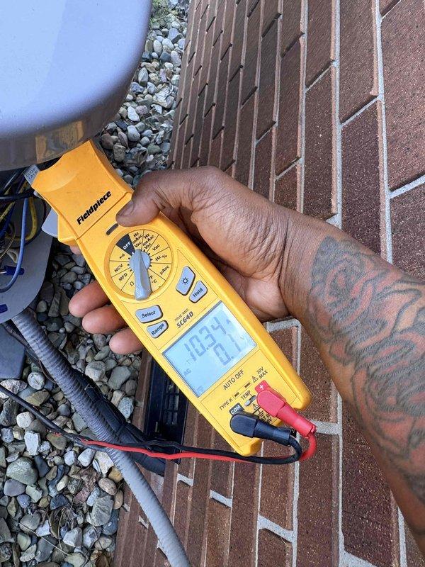 Completed comprehensive AC tune-up for new homeowner at property with previously installed equipment. Performed electrical diagnostics and voltage testing at exterior unit using digital multimeter to verify proper system operation. Inspected and replaced air filtration media with new pleated filters to ensure optimal airflow and indoor air quality for the cooling season.