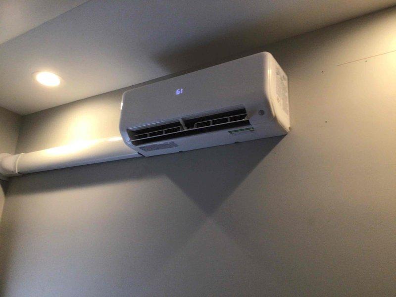 Successfully installed a Carrier Performance Series 1.5-ton multizone ductless heat pump system with two 9K BTU high wall mounted cassettes. Installation included running two new copper linesets from outdoor unit to indoor cassettes, installing electrical wiring between units, routing condensate drain lines with line hide for clean appearance, mounting outdoor unit on wall bracket, and installing disconnect switch. System was evacuated to proper micron levels, charged with refrigerant per manufacturer specifications, and tested for proper operation with all functions confirmed working correctly.