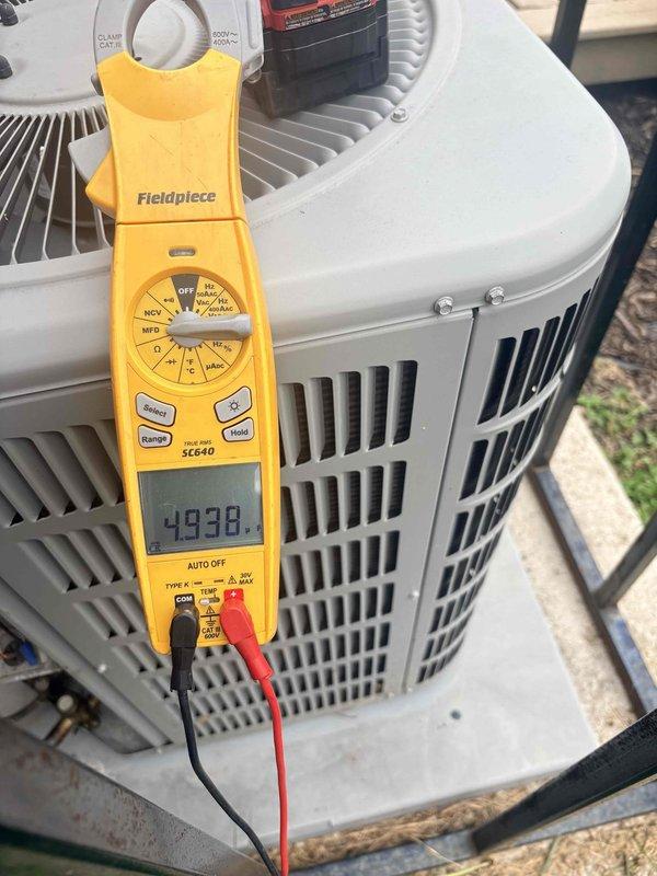 Completed annual cooling maintenance on residential HVAC system. Inspected indoor air handler components including blower motor assembly, electrical connections, and control board; verified proper wiring and grounding. Performed outdoor condenser unit inspection and diagnostic testing, recording voltage reading of 493.8V using calibrated multimeter. All components operating within normal parameters; system ready for cooling season.