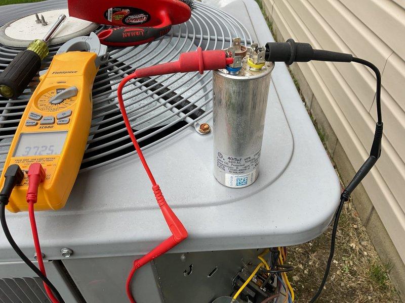Completed comprehensive cooling maintenance on residential HVAC system, including inspection of indoor air handler with blower unit and control board, and outdoor condenser unit. Performed electrical diagnostics using digital multimeter to test capacitor functionality and verify proper voltage readings at all connection points. Replaced air filters as part of routine maintenance protocol and confirmed all system components operating within manufacturer specifications.