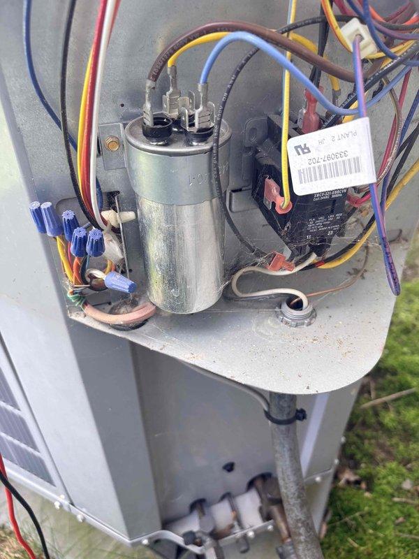 Completed scheduled cooling maintenance on residential air conditioning unit. Performed comprehensive electrical diagnostics including voltage measurements at outdoor unit junction box, verifying proper electrical supply and connections. Inspected and tested capacitor and associated wiring harness, confirming all terminal connections secure and electrical components operating within manufacturer specifications. System tested and operating properly.