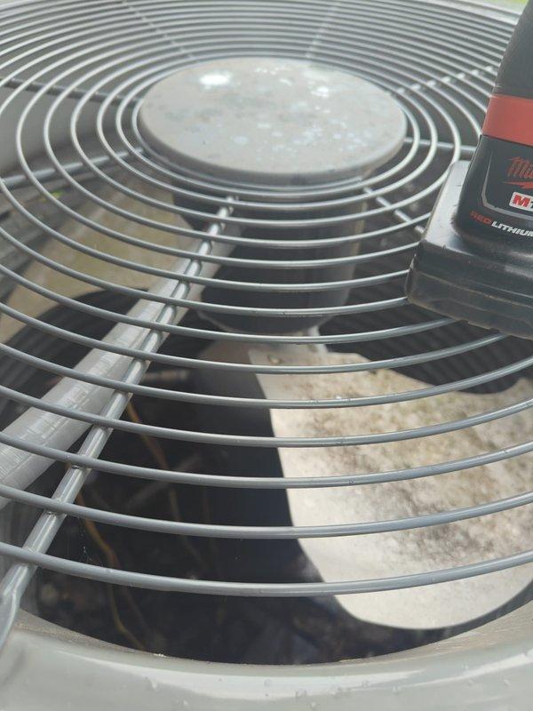 Completed comprehensive AC tune-up on residential cooling system, performing standard maintenance protocol including electrical diagnostics and performance testing. Measured capacitance readings at 417 μF using calibrated clamp meter to verify compressor and fan motor operation within manufacturer specifications. Inspected outdoor condenser unit components including fan assembly, motor housing, and heat exchanger coils, confirming all equipment operating properly with maintenance plan renewal processed.