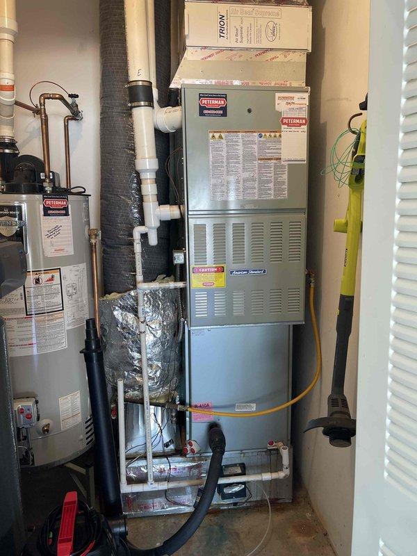 Completed comprehensive estimate for full HVAC system replacement at residential property. Evaluated existing Coleman furnace installation located in interior mechanical closet alongside water heater, assessed exterior electrical disconnect box mounted on brick exterior wall, and documented current ductwork configuration including flexible and metallic insulated ducting with PVC venting. Provided replacement options and specifications for complete heating and cooling system upgrade.
