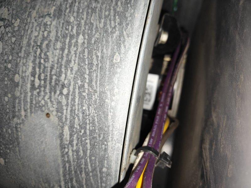 Completed routine cooling maintenance on residential HVAC system and discovered significant frost buildup on evaporator coil and ductwork, indicating restricted airflow or low refrigerant charge. Measured system temperatures using digital clamp meter, inspected evaporator coil condition, and documented heavy ice formation on metal panels with visible condensation streaking. Recommended immediate follow-up to address airflow restriction or refrigerant issue to prevent compressor damage and restore proper cooling operation.