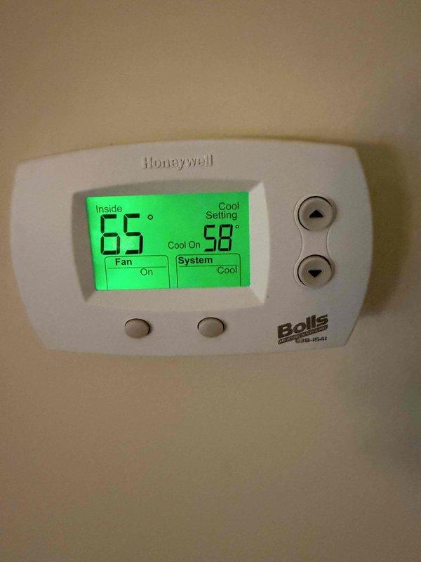 Returned to diagnose Lennox heat pump system per customer request for follow-up evaluation. Upon inspection, identified failed control board with no power present. Verified thermostat was calling for cooling with system set to 58 degrees while inside temperature read 65 degrees, confirming communication attempt from thermostat. Tested electrical supply to control board and confirmed complete board failure with no LED indicators illuminated and no relay operation. Documented failed control board condition with photographic evidence showing TE and Omron relays, capacitors, and other board components. Presented repair options to customer for control board replacement to restore heat pump operation.