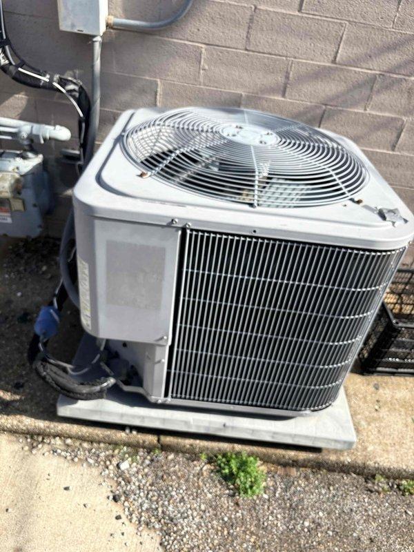 Completed scheduled cooling maintenance as part of annual commercial HVAC agreement (service 1 of 4). Replaced Aprilaire #410 cylindrical air filter with new pleated media element, inspecting filter housing for proper seal and fit. Performed comprehensive inspection of outdoor condenser unit, verifying fan operation, checking refrigerant line insulation integrity, and confirming adequate clearances around equipment on concrete pad.