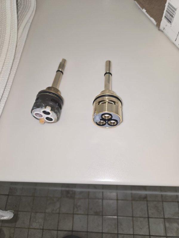 Replaced worn faucet cartridges on commercial utility sink to restore proper water flow and temperature control. Removed old corroded cartridges and installed new replacement cartridges with fresh O-ring seals, completing the quoted repair work.