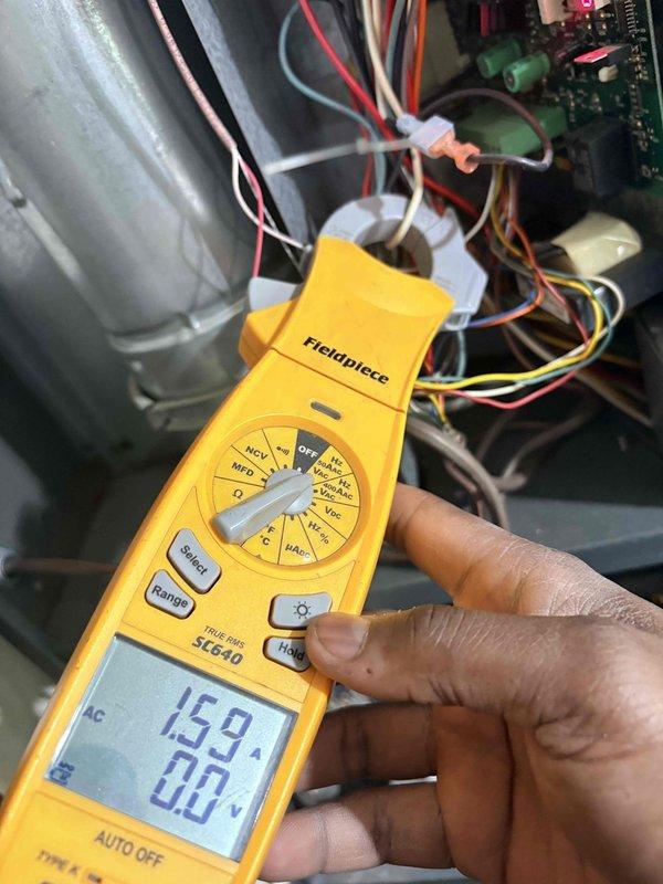 Completed scheduled cooling maintenance on residential HVAC system. Performed comprehensive system diagnostics including temperature differential measurements across evaporator coil registering 950.5°F and electrical testing of control circuits showing 15.9 microamps draw with 0.0V at tested connection points. Inspected all wiring connections, control board operation, and refrigerant lines; verified proper insulation integrity and confirmed system operating within normal parameters with no deficiencies noted.