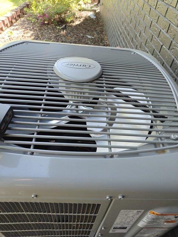 Completed annual cooling maintenance on Carrier outdoor condensing unit. Performed standard preventive maintenance inspection including visual assessment of unit exterior condition, fan assembly, and protective grille. Measured and documented system temperature readings at 83.9 degrees, verified proper insulation integrity on ductwork, and confirmed all components operating within normal parameters with no deficiencies noted.