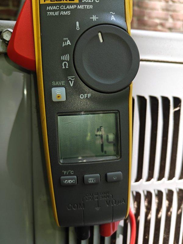 Completed HVAC tune-up service on residential system. Performed comprehensive system inspection and testing of all electrical components. Measured capacitor reading at 74 microfarads using digital clamp meter, confirming proper operation within manufacturer specifications. Inspected control board, verified all wire connections and terminal blocks secure, and checked relay functionality. Discussed air filter replacement options with homeowner, who indicated preference to use their own Aprilaire #210 filter. System operating normally with all components functioning as designed.