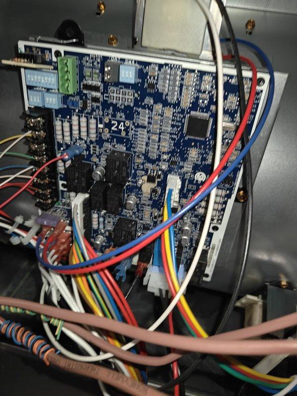 Completed HVAC tune-up service on residential system. Performed comprehensive system inspection and testing of all electrical components. Measured capacitor reading at 74 microfarads using digital clamp meter, confirming proper operation within manufacturer specifications. Inspected control board, verified all wire connections and terminal blocks secure, and checked relay functionality. Discussed air filter replacement options with homeowner, who indicated preference to use their own Aprilaire #210 filter. System operating normally with all components functioning as designed.