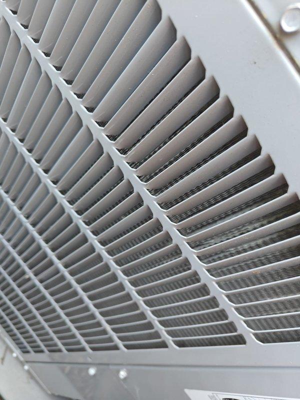 Completed comprehensive cooling maintenance on two HVAC systems. Performed thorough inspection of air handling units, including examination of perforated metal housing panels, internal components, and structural integrity of both systems. Inspected ventilation grilles and multi-layer filtration systems, confirming proper airflow through angled slats and mesh screening. All components found to be in good operating condition with no visible corrosion, damage, or debris accumulation. Systems tested and operating within normal parameters.