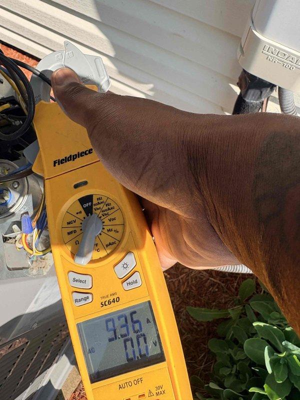 Completed scheduled cooling maintenance on outdoor condensing unit. Performed system diagnostics and electrical measurements, recording voltage readings of 120.0V and amperage of 49.40A, with supply air temperature measured at 93.6°F. Verified proper electrical operation, inspected refrigerant line connections, and confirmed system operating within normal parameters; customer-supplied filter available on-site for replacement.