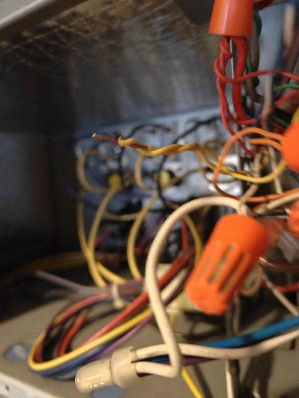 Responded to no cooling complaint and found tripped breaker affecting both air conditioning and water heating systems. Reset breaker at electrical panel and verified power restoration to HVAC unit, confirming 16.1-volt reading at equipment. System restored to normal operation with proper electrical supply confirmed.